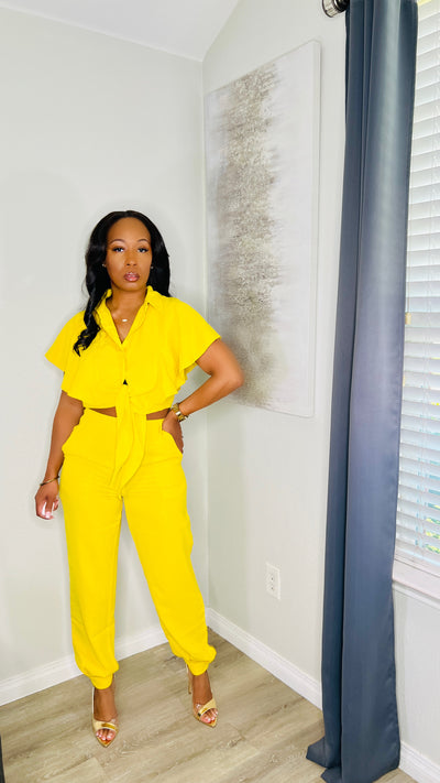 Model wearing the Mia Pant Set, showcasing its elegant non-stretch fabric and zipper closure.