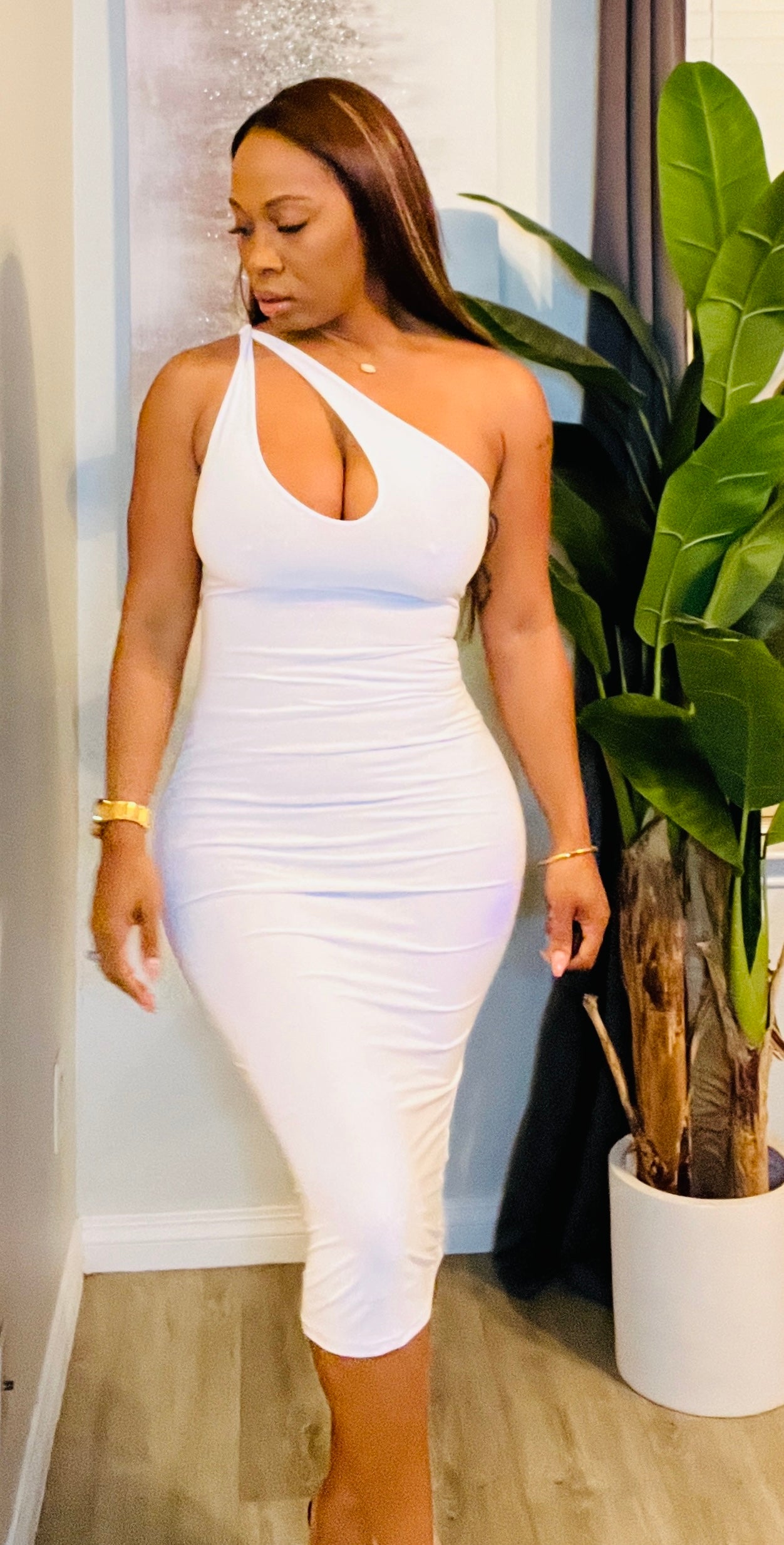 Peekaboo Dress in white, featuring a one-shoulder design and cut-out details